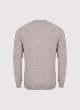 Wełniany sweter w kolorze beżowym