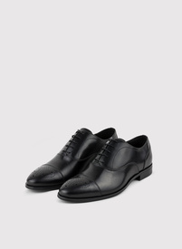 Czarne buty męskie typu brogsy