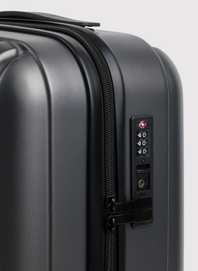 Mała ciemnoszara walizka ze żłobieniami